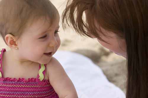 mother talking to baby