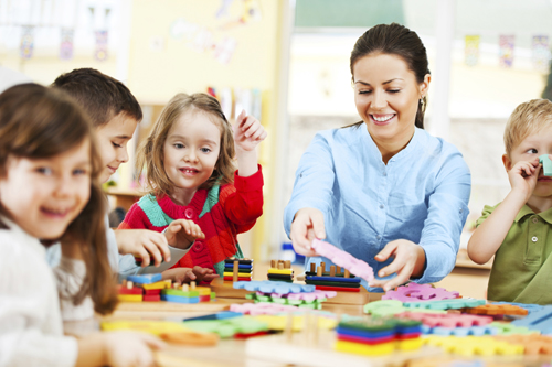 teacher playing with kids