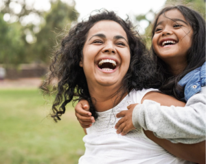 Mom and daughter laughing